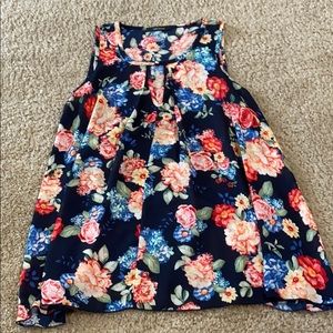 Floral dressy sleeveless top. Color swatch brand